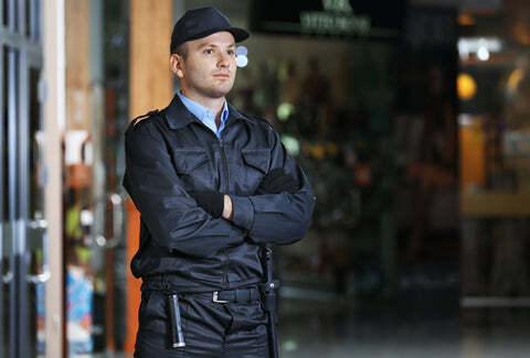 Security guard standing watch