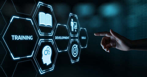 Finger pointing at screen with words and shapes